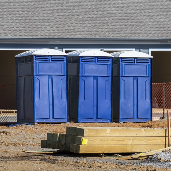 what is the cost difference between standard and deluxe portable restroom rentals in Iron River Wisconsin